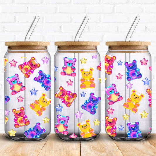 Colourful gummy bear and star pattern PNG wrap for 16oz Libbey glass cans. This digital download features cute rainbow gummy bears in pink, blue, yellow, and purple with shiny stars, perfect for sublimation, UV DTF, or DTF printing. A fun, kawaii-style tumbler wrap design ideal for playful drinkware, sweet-themed gifts, or candy shop vibes. Great for kids, party favours, or girly accessories with a bold, cheerful look.