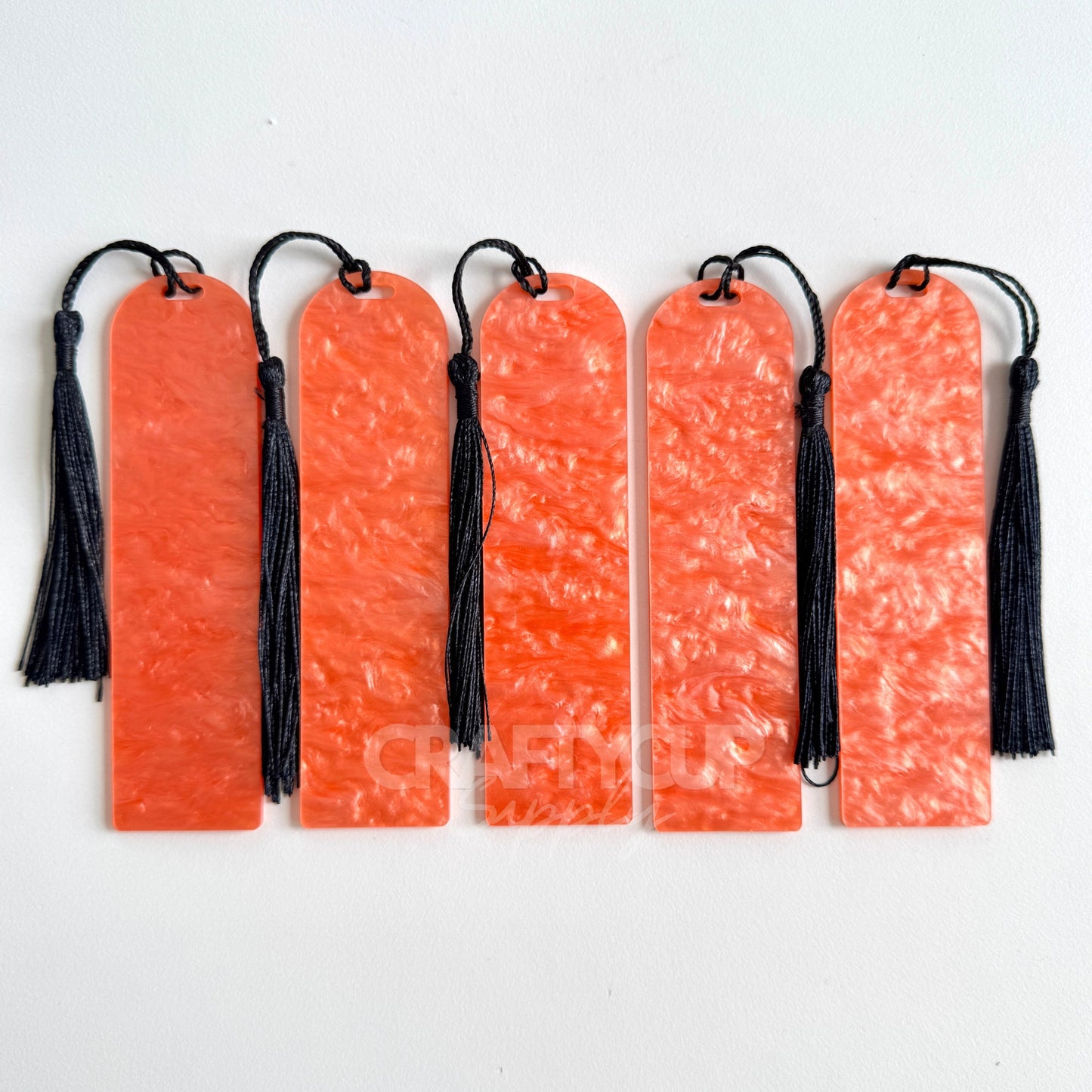 orange Oil slick swirl acrylic bookmark blank measuring 12x3.2cm with unique embedded pattern, clear finish, pre-cut hole, and included tassel – perfect for UV DTF and vinyl crafting.