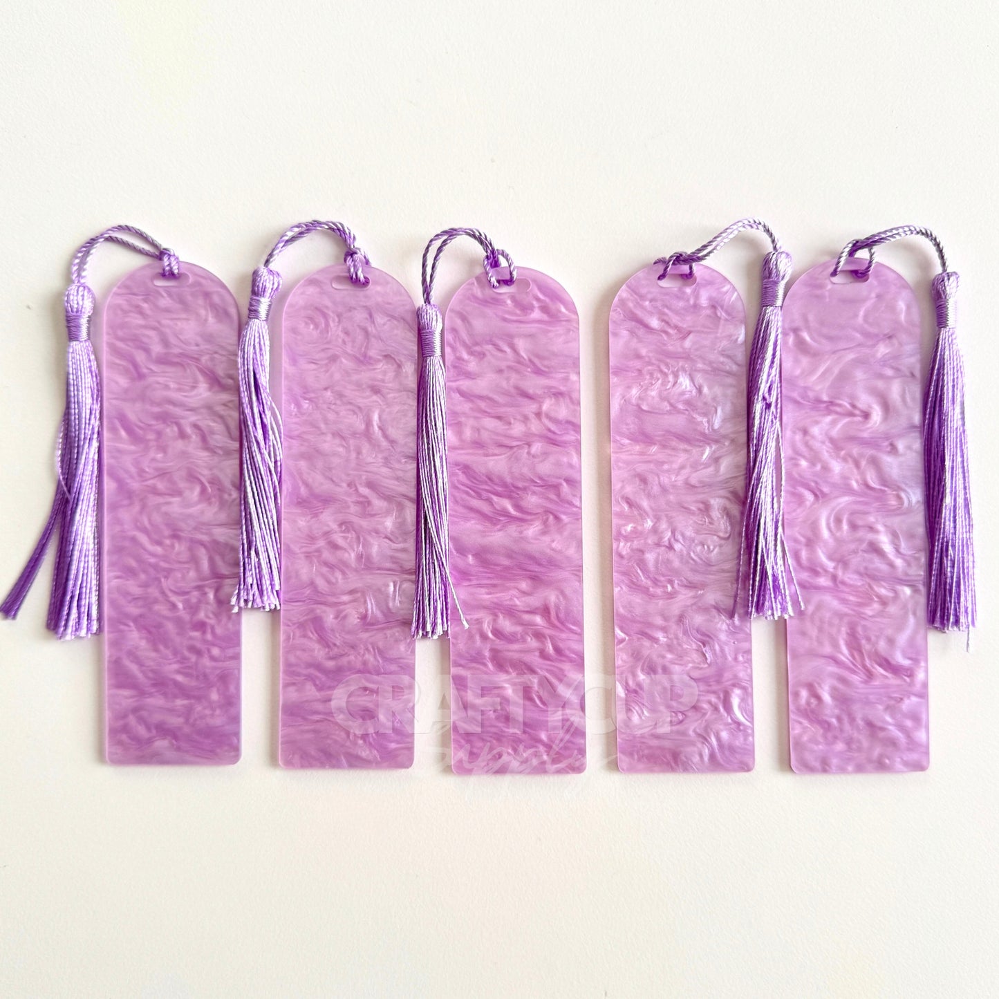 lilac Oil slick swirl acrylic bookmark blank measuring 12x3.2cm with unique embedded pattern, clear finish, pre-cut hole, and included tassel – perfect for UV DTF and vinyl crafting.