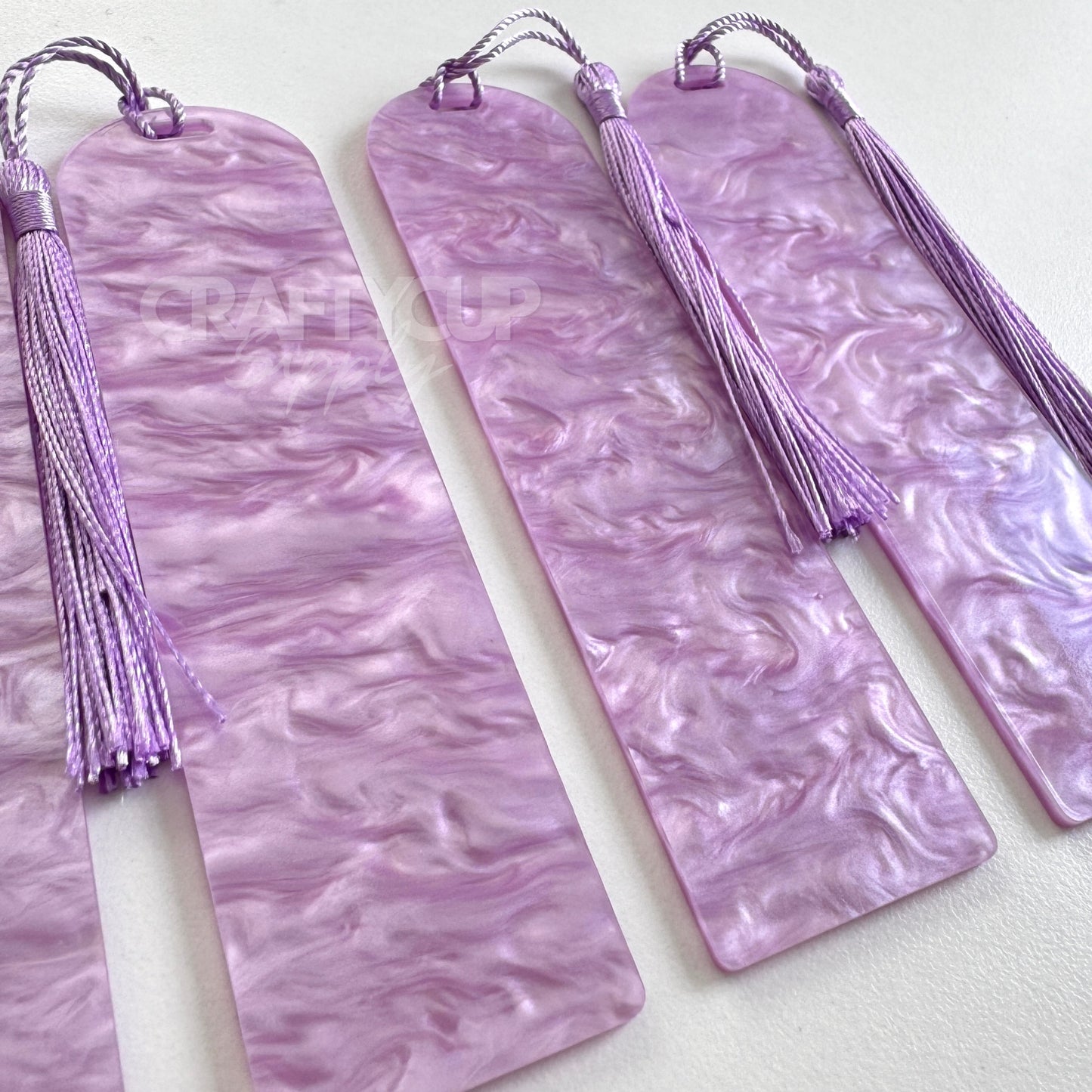 lilac Oil slick swirl acrylic bookmark blank measuring 12x3.2cm with unique embedded pattern, clear finish, pre-cut hole, and included tassel – perfect for UV DTF and vinyl crafting.