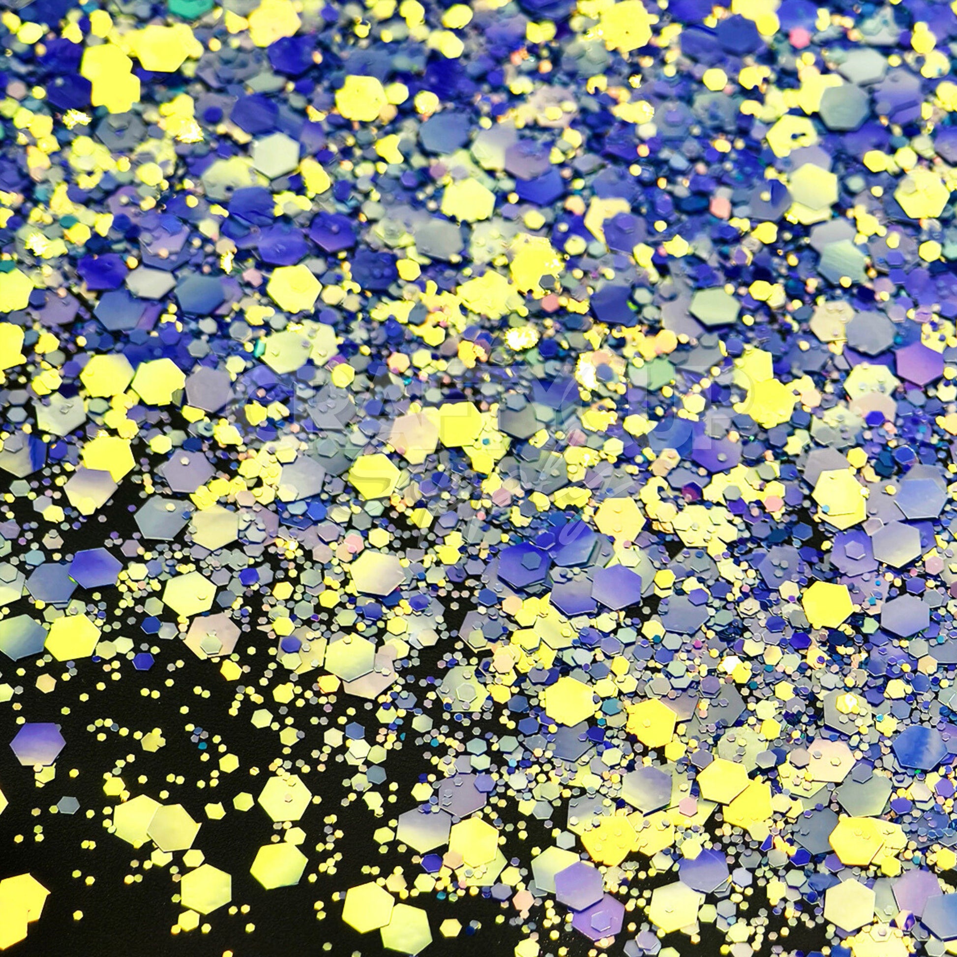 Navy and silver glitter mix with strong reflective sparkle, suitable for wax melts and painting.