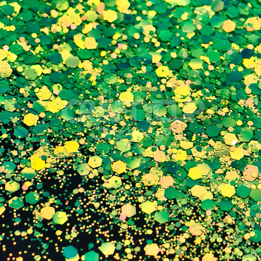 Deep emerald green chunky glitter mix, highly reflective and perfect for crafts, painting, and wax melts.