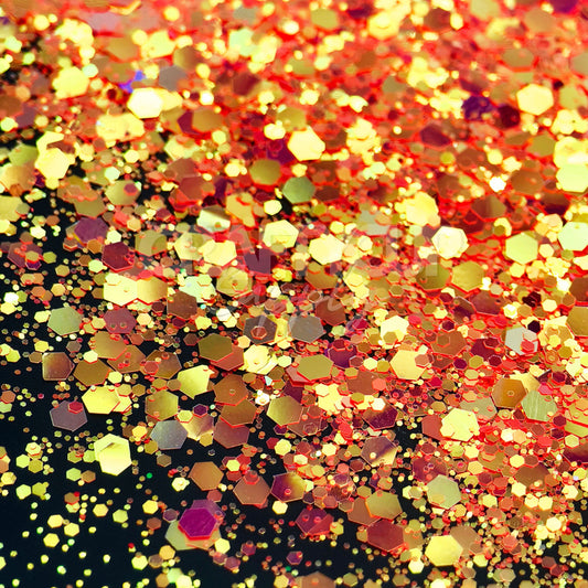 Warm golden-orange chunky glitter, polyester-based for durable, solvent-resistant shine.