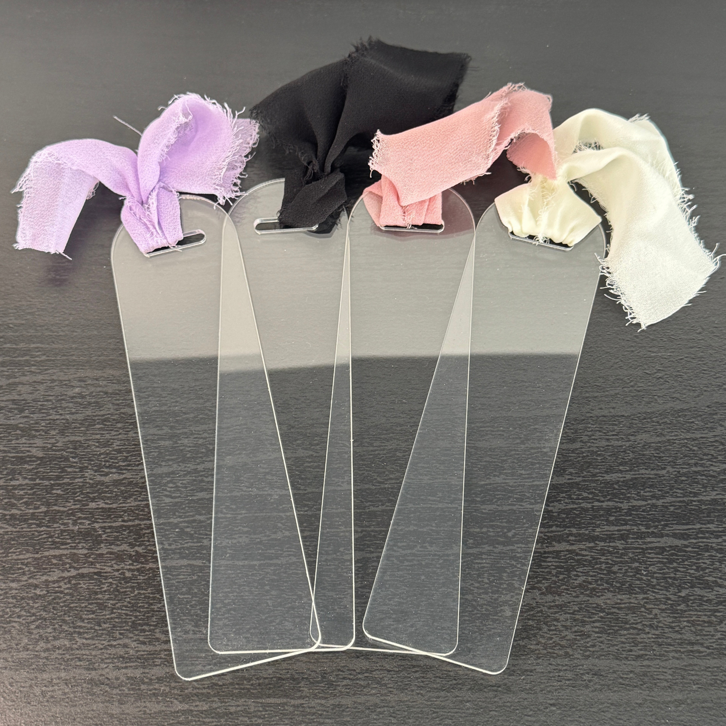 premium thick clear acrylic bookmarks with coquette colourful ribbon bow attached. Can be used for vinyl, uv dtf and more.