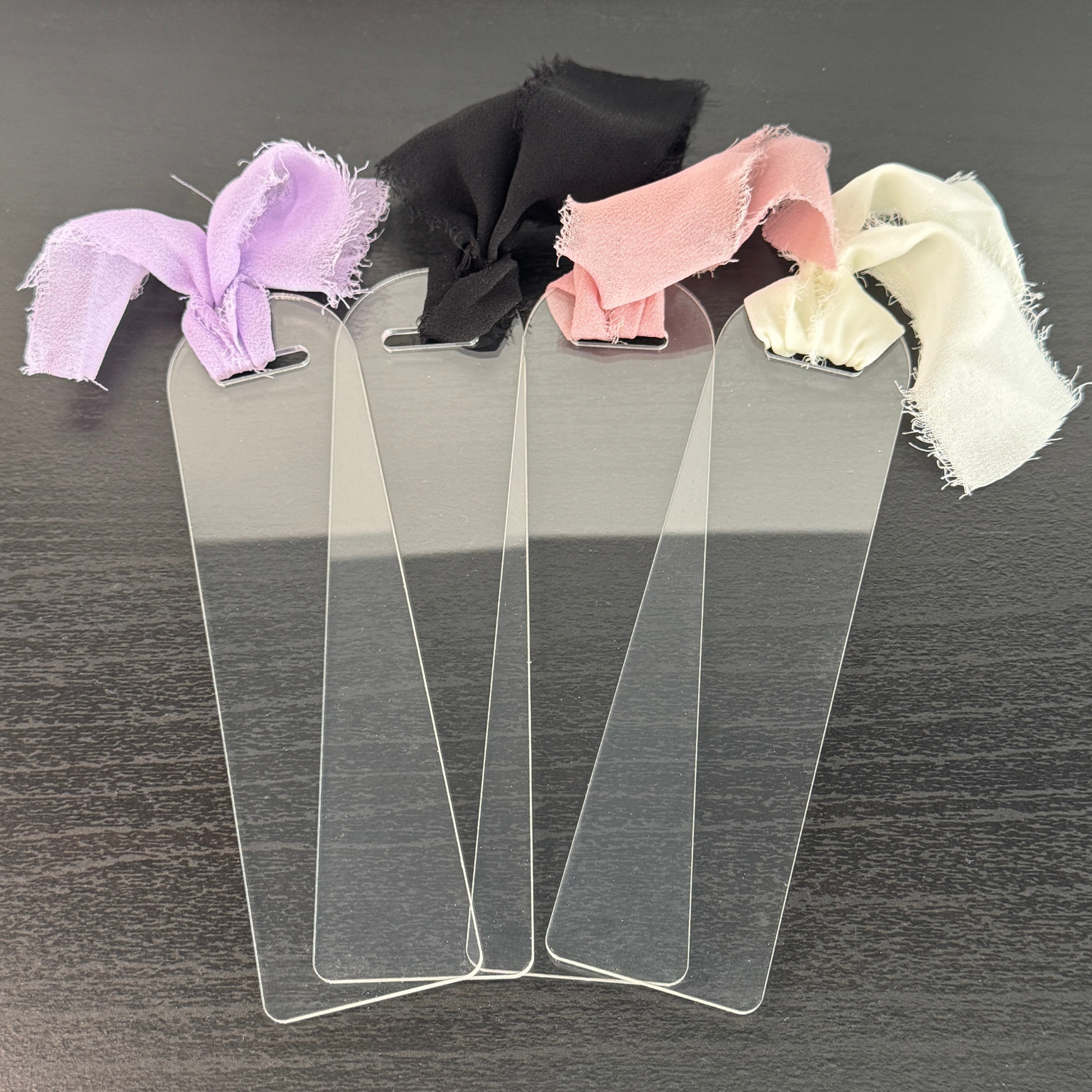 premium thick clear acrylic bookmarks with coquette colourful ribbon bow attached. Can be used for vinyl, uv dtf and more.