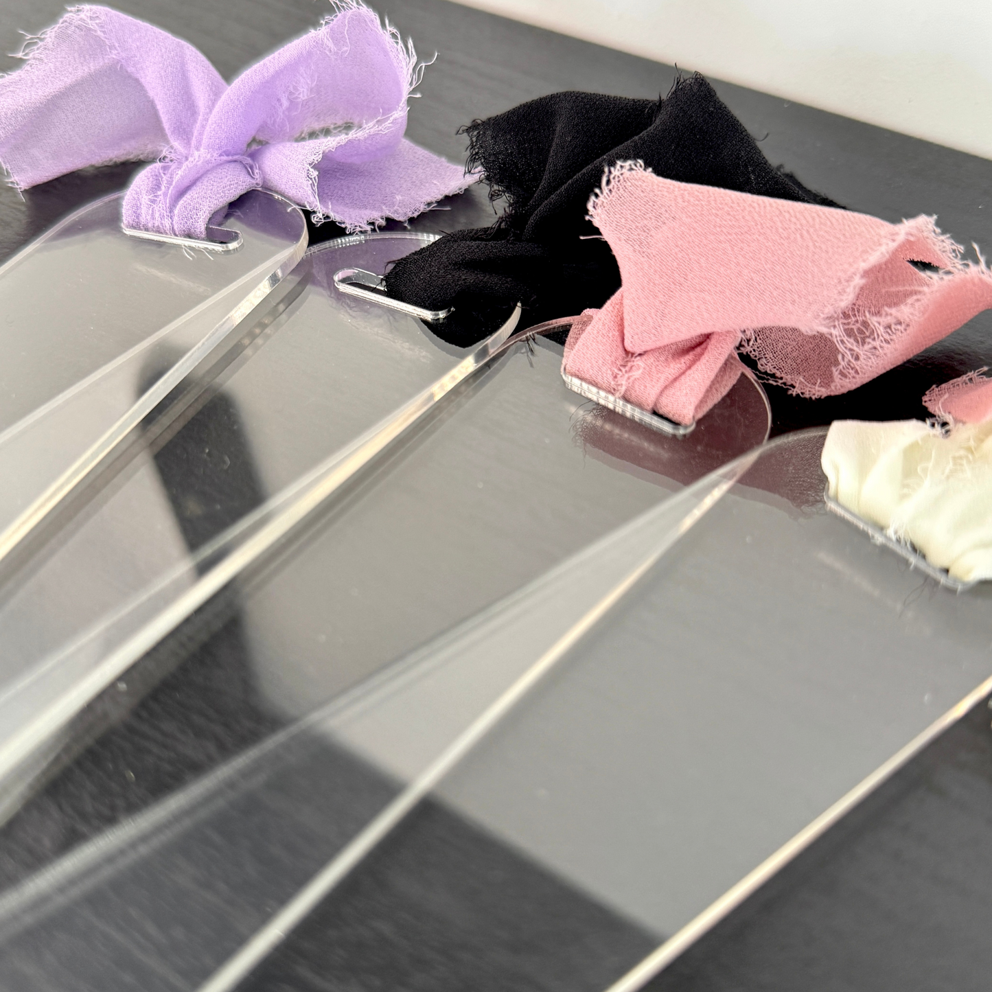 premium thick clear acrylic bookmarks with coquette colourful ribbon bow attached. Can be used for vinyl, uv dtf and more.