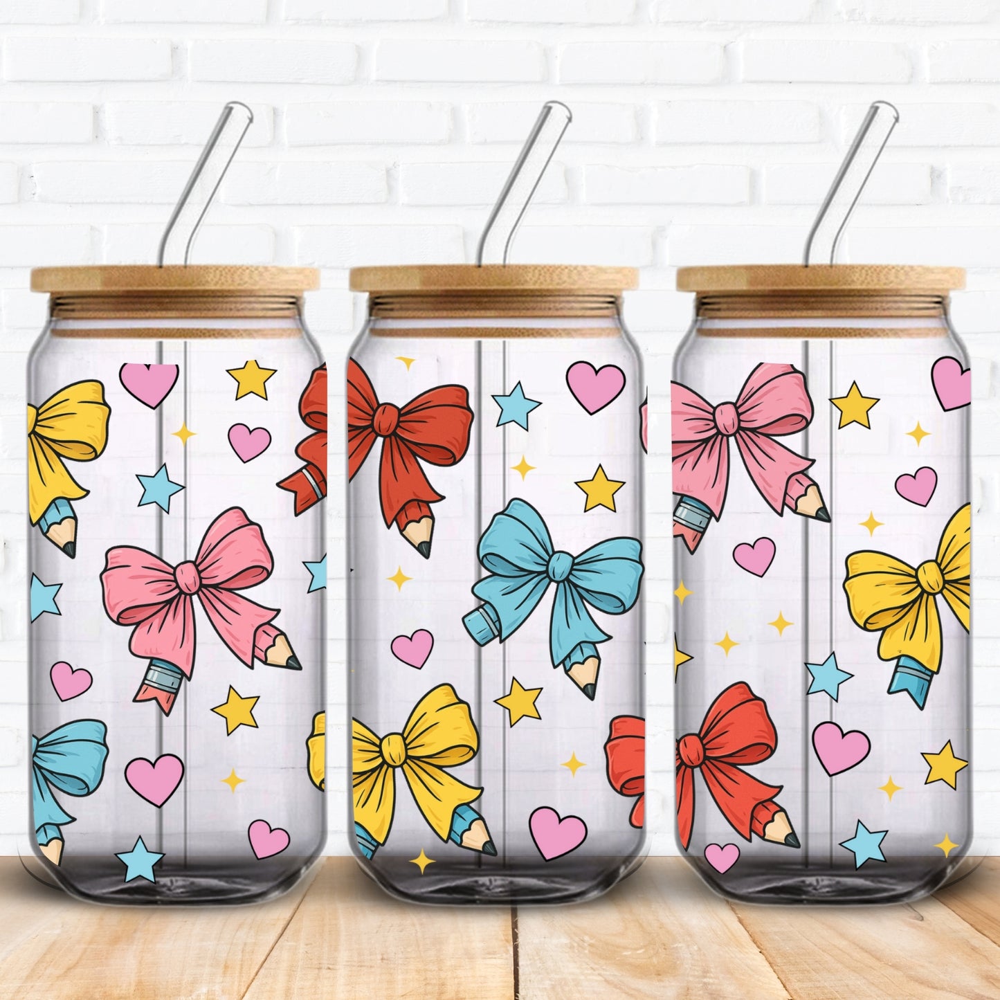 a cute uvdtf design showing coquette style design of pencil bows which is ideal for a teacher gift 16oz libbey glass can wrap