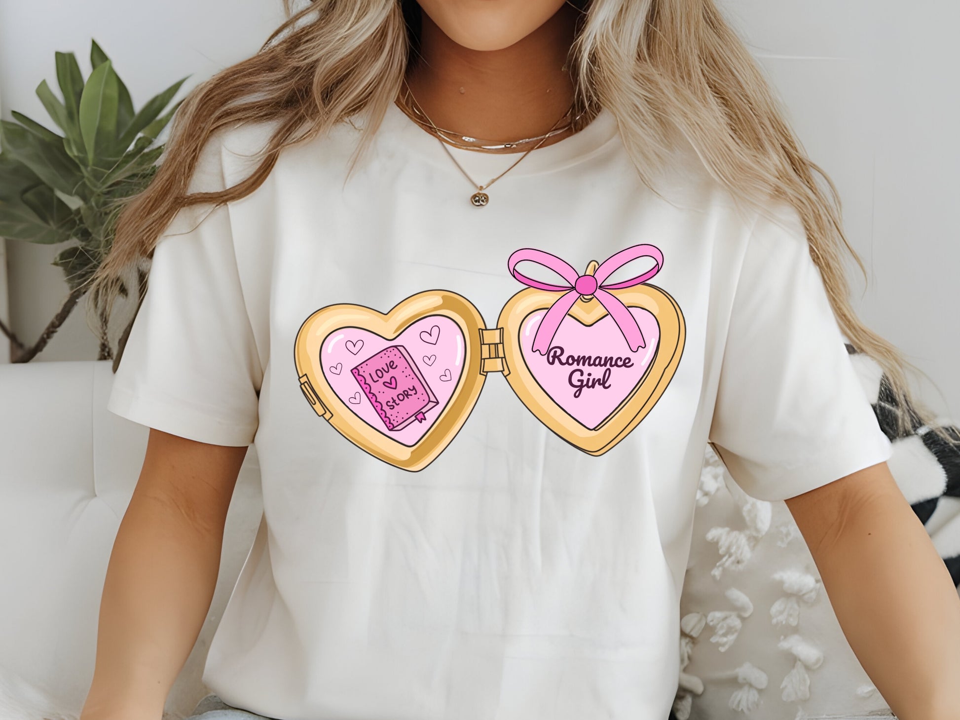 a cute trending and popular PNG digital download design of a gold love heart locket featuring bookish genres for book reading girls.  Can be used to create physical stickers or use for sublimation on clothing such as t shirts, jumpers and canvas bags