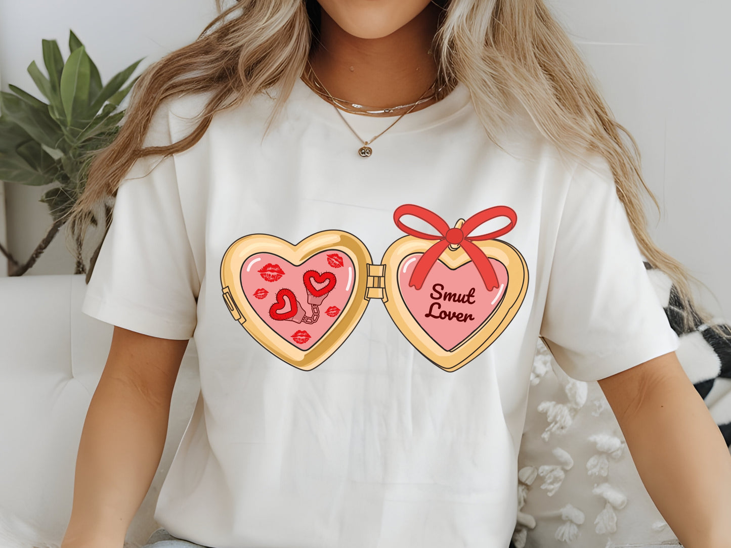 a cute trending and popular PNG digital download design of a gold love heart locket featuring bookish genres for book reading girls.  Can be used to create physical stickers or use for sublimation on clothing such as t shirts, jumpers and canvas bags