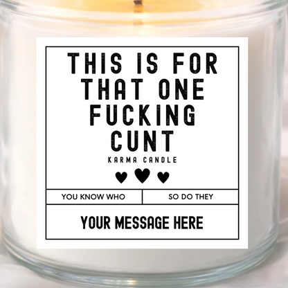 Candle with a label on a white background, with text 'This is for that one fucking cunt' and space for personalization.
