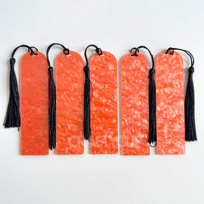 orange Oil slick swirl acrylic bookmark blank measuring 12x3.2cm with unique embedded pattern, clear finish, pre-cut hole, and included tassel – perfect for UV DTF and vinyl crafting.