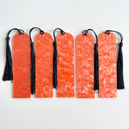 orange Oil slick swirl acrylic bookmark blank measuring 12x3.2cm with unique embedded pattern, clear finish, pre-cut hole, and included tassel – perfect for UV DTF and vinyl crafting.