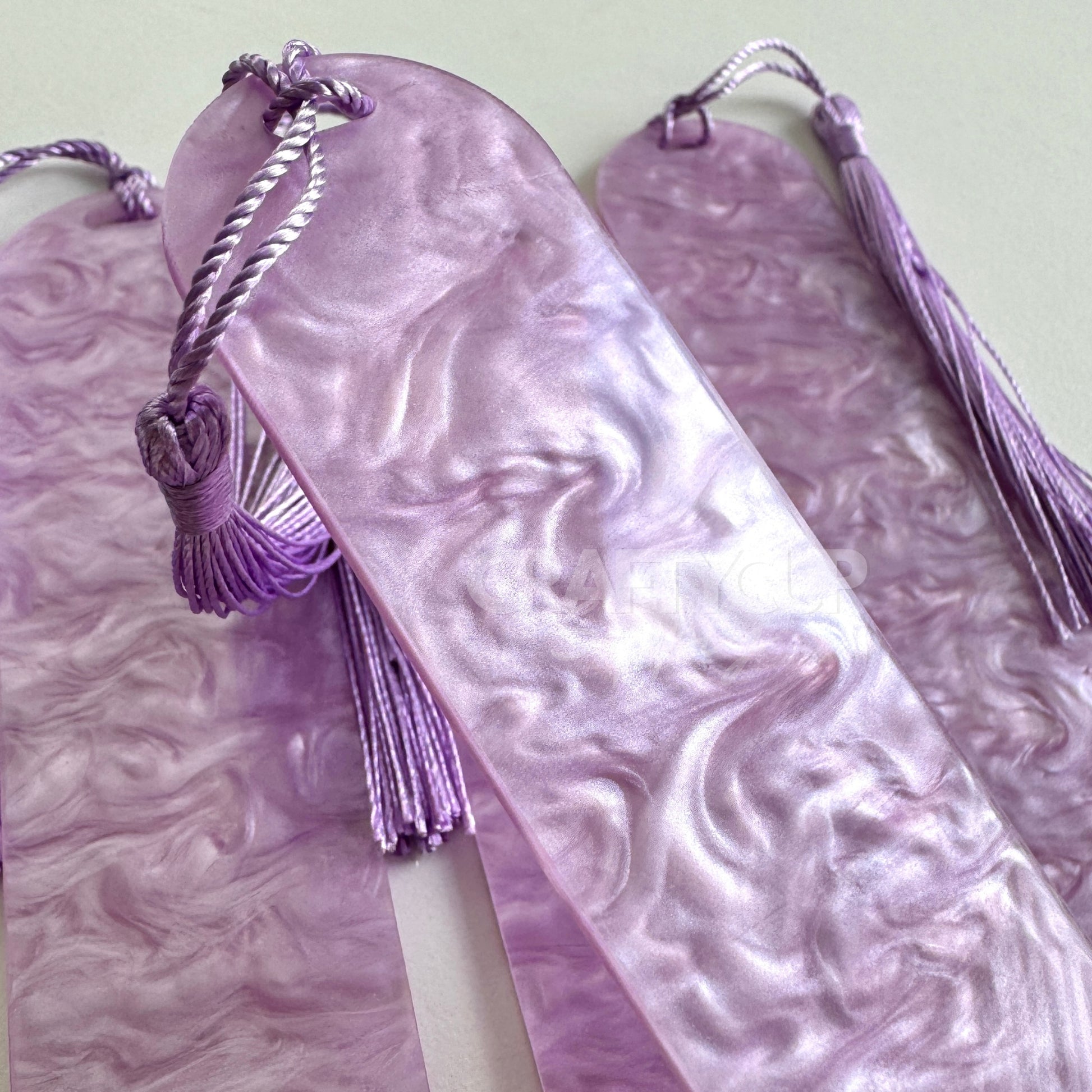 lilac Oil slick swirl acrylic bookmark blank measuring 12x3.2cm with unique embedded pattern, clear finish, pre-cut hole, and included tassel – perfect for UV DTF and vinyl crafting.