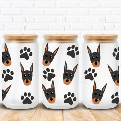 Three jars with dog illustrations and paw prints on a white brick wall background