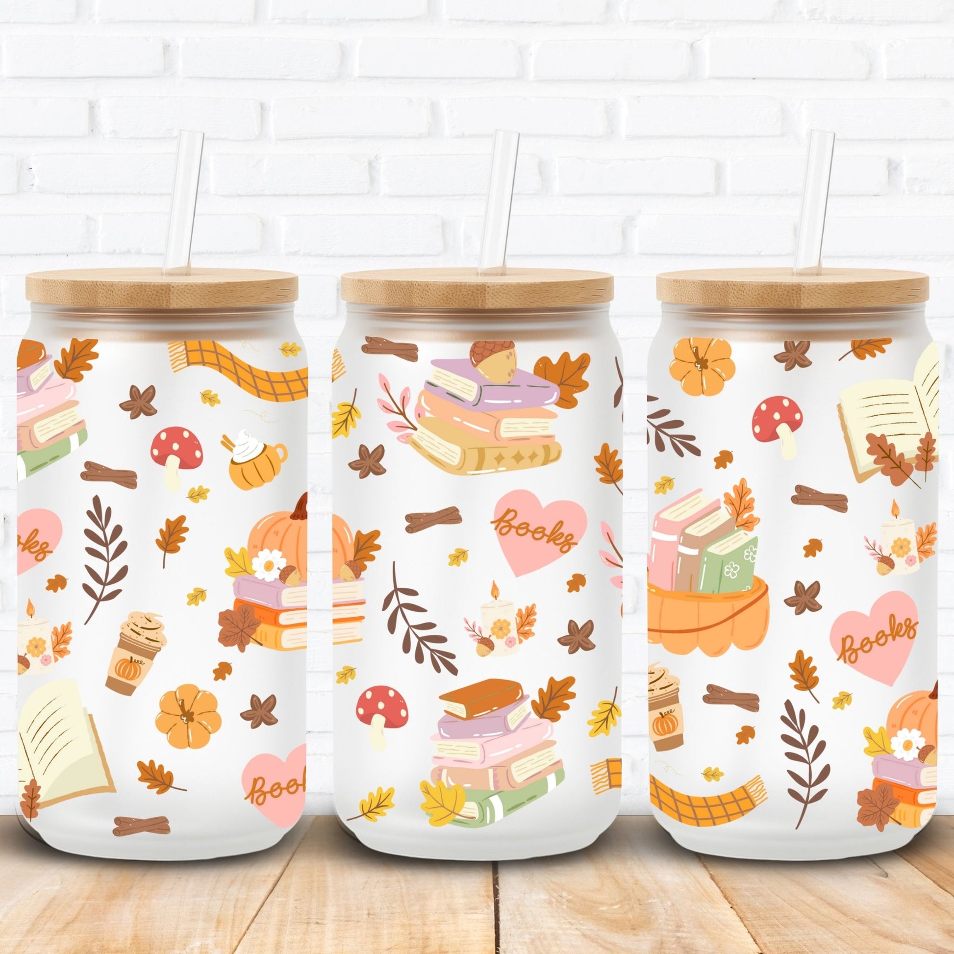 Autumn bookish sublimation wrap for 16oz and 20oz Libbey glass cans featuring cozy fall vibes with stacked books, pumpkins, candles, coffee cups, scarves, mushrooms, hearts with 'books' text, acorns, and autumn leaves. Seamless high-resolution PNG perfect for sublimation and UV DTF crafting. Ideal for book lovers, cozy reading season, fall décor, and pumpkin spice inspired glass can tumblers. Great gift for autumn readers and seasonal drinkware lovers.
