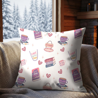 Pastel book lover digital paper displayed on a decorative cushion with romance books, reading corner signs, heart mugs and cosy bookish illustrations.