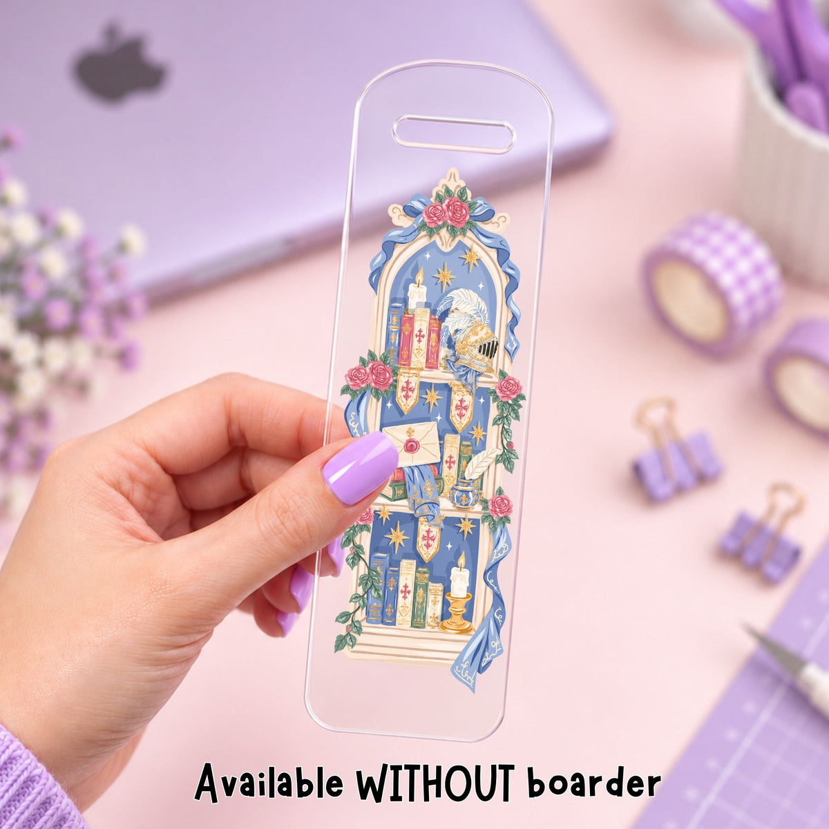 A hand with lavender nail polish holds a clear phone case featuring a detailed blue and gold angelic library illustration. The background is a soft pink desk with purple-themed stationery, a purple laptop, and a text overlay at the bottom reading 'Available WITHOUT boarder'.