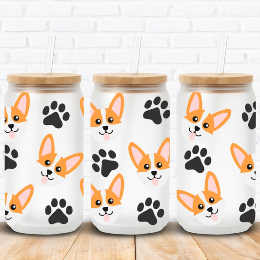 libbey glass cans with wooden lids featuring corgi dog illustrations and black paw prints on a white brick wall background.
