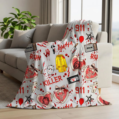 Halloween horror seamless digital paper printed on a throw blanket with slasher movie inspired masks, bloody handprints and creepy clown illustrations.