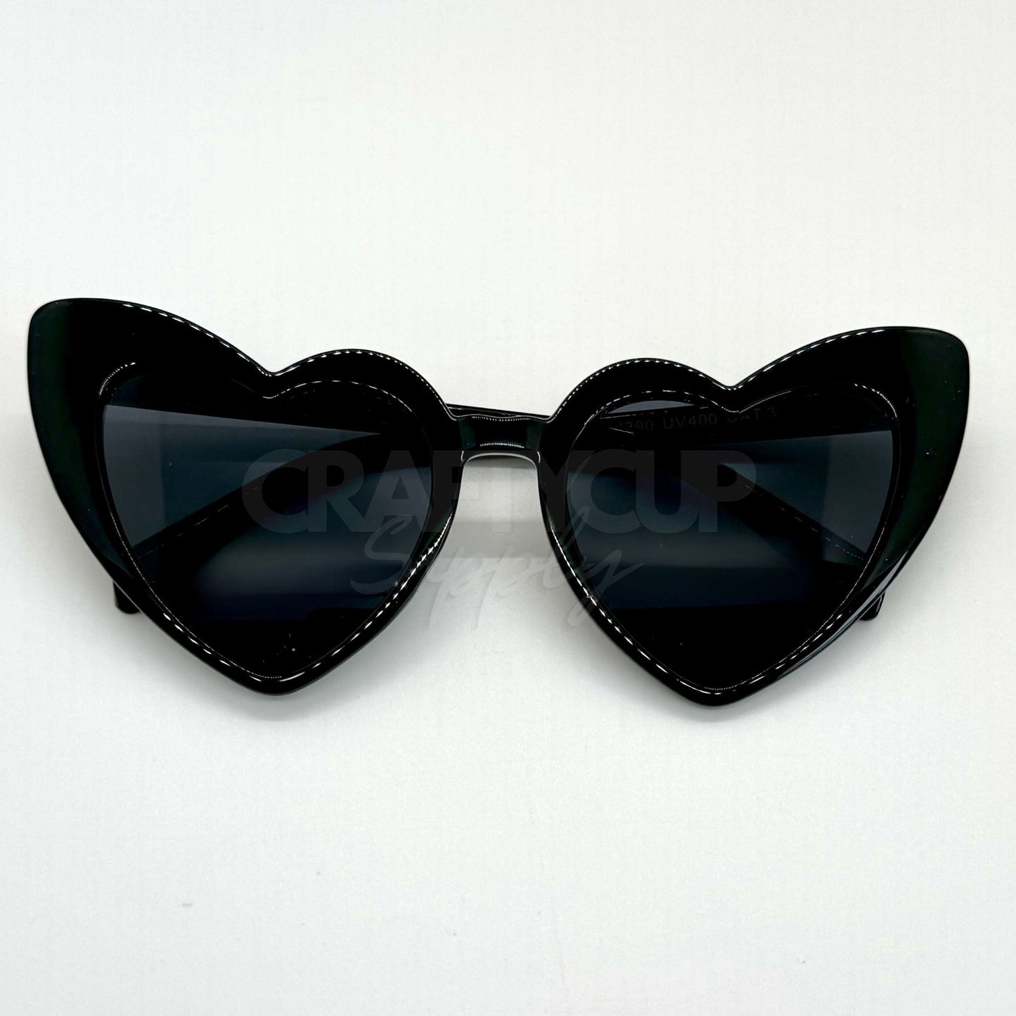 black heart shaped plastic glasses