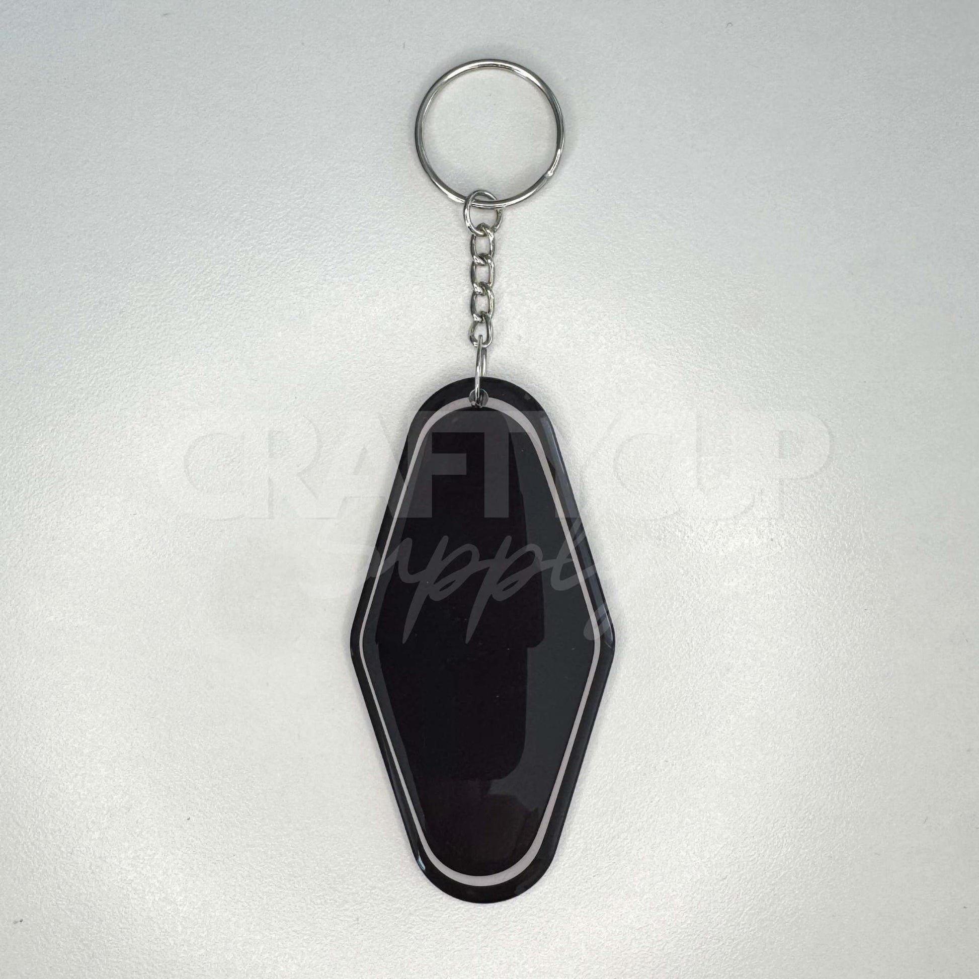 Black NFC motel shaped tag keyring designed for contactless digital business cards and payment links