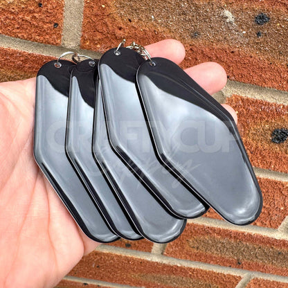 Black NFC motel shaped tag keyring designed for contactless digital business cards and payment links